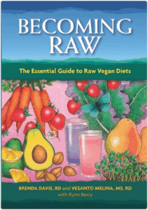 Cover of "Becoming Raw," a guide to raw vegan diets with fresh fruits and vegetables.