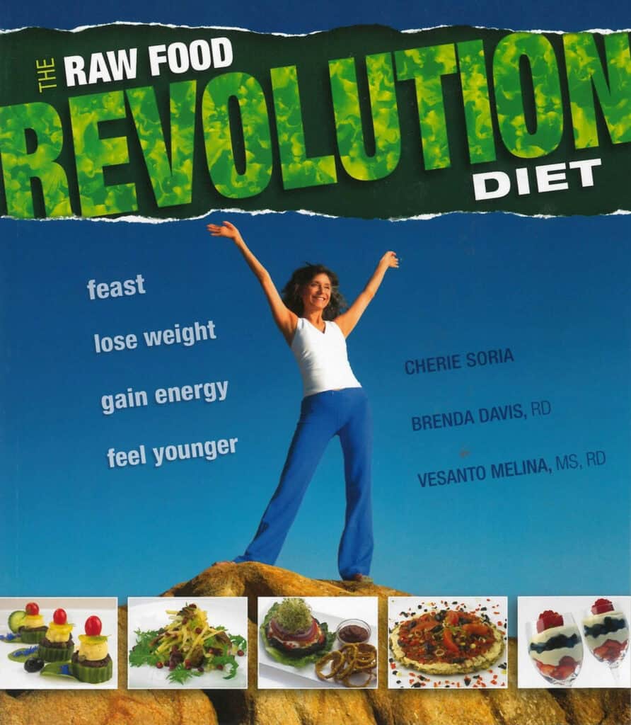 Cover of the Raw Food Revolution Diet book featuring a woman celebrating health.