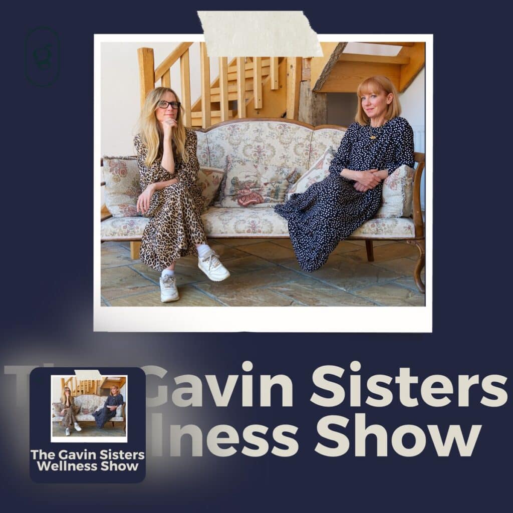 Two women discussing plant-based nutrition on a cozy sofa, promoting wellness and healthy eating.